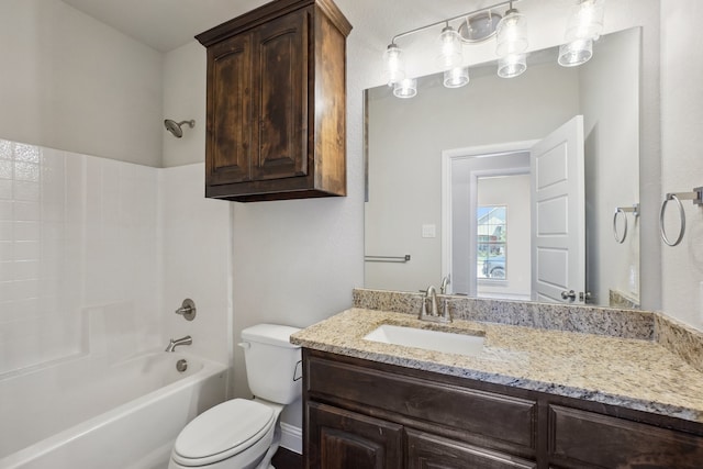 full bathroom with vanity, toilet, and shower / washtub combination