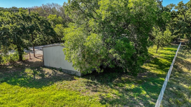 view of outdoor structure with a yard