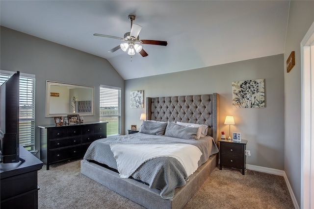 bedroom with ceiling fan, multiple windows, and light colored carpet