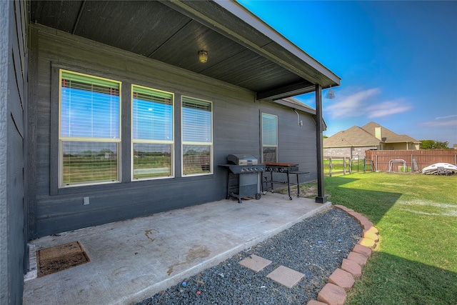 view of patio with a grill