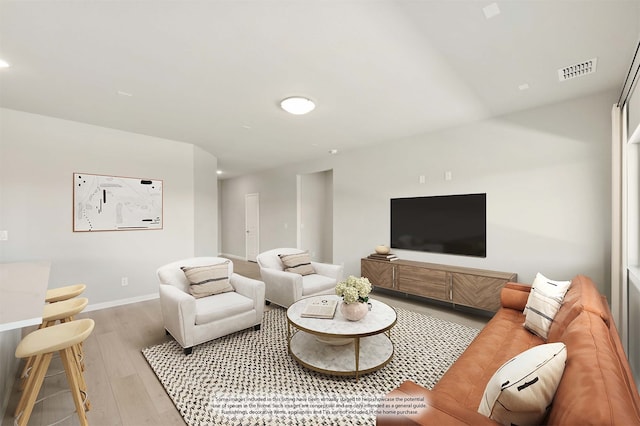 living room with hardwood / wood-style floors