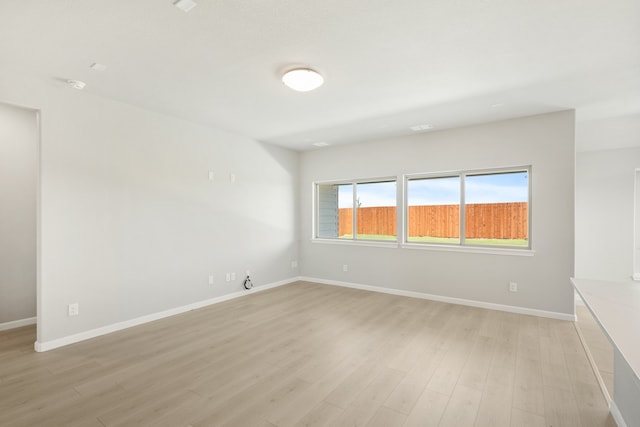 empty room with light wood-type flooring