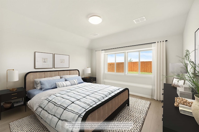 bedroom with light hardwood / wood-style flooring