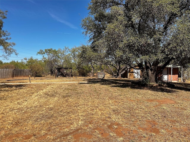 view of yard featuring fence