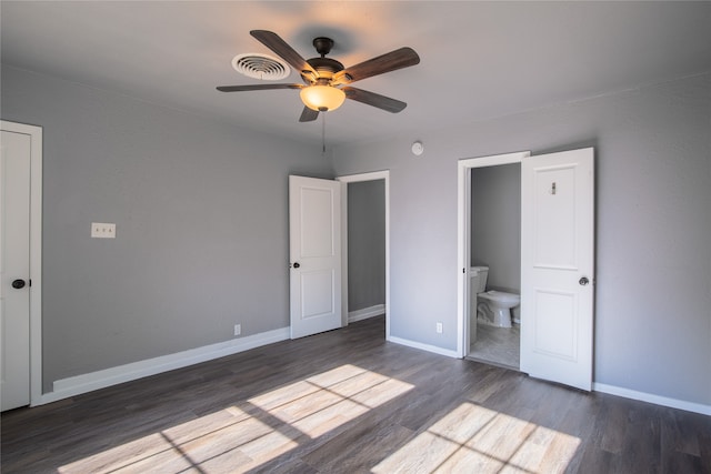 unfurnished bedroom with ceiling fan, connected bathroom, and hardwood / wood-style floors