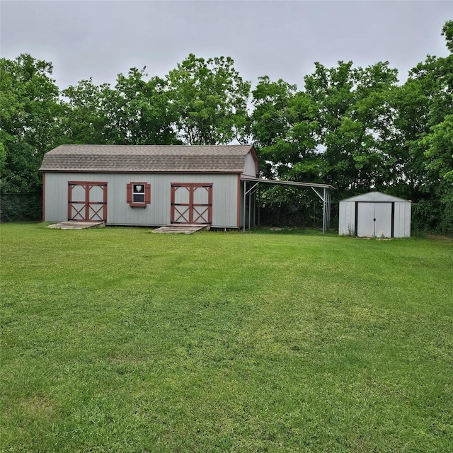 view of outbuilding with a yard