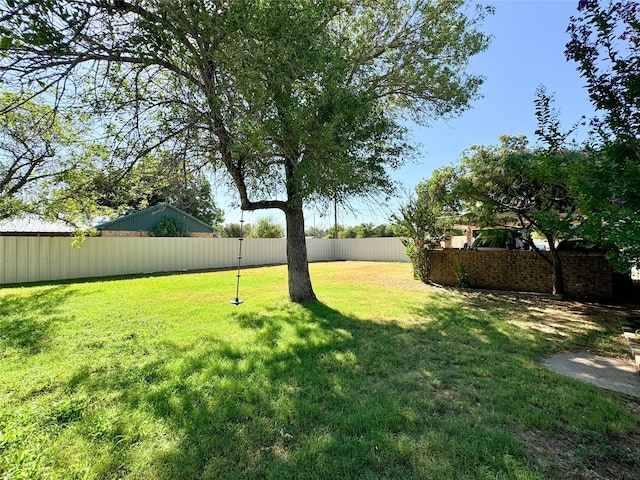 view of yard with fence