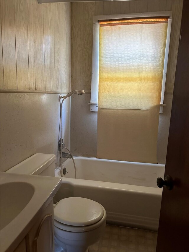 full bathroom featuring tile patterned floors, vanity, shower / bathing tub combination, and toilet