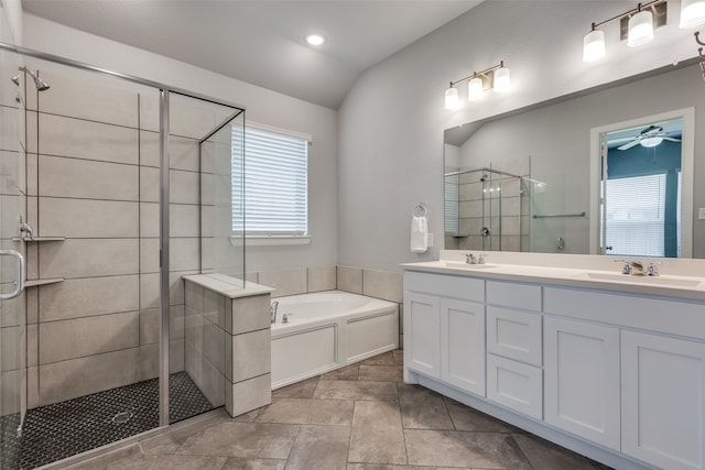 bathroom with lofted ceiling, ceiling fan, independent shower and bath, and vanity