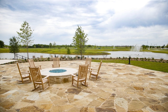 view of patio featuring a water view