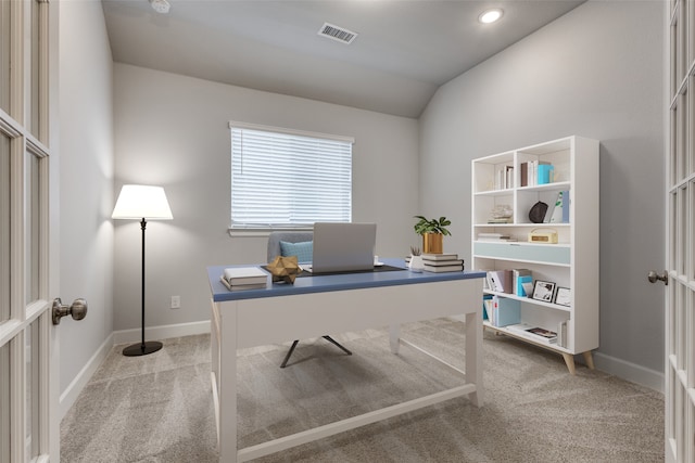 carpeted office with vaulted ceiling and french doors