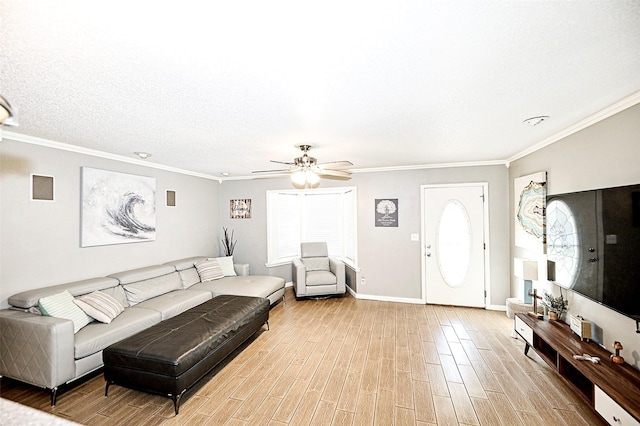 living room featuring crown molding, ceiling fan, and light wood-type flooring