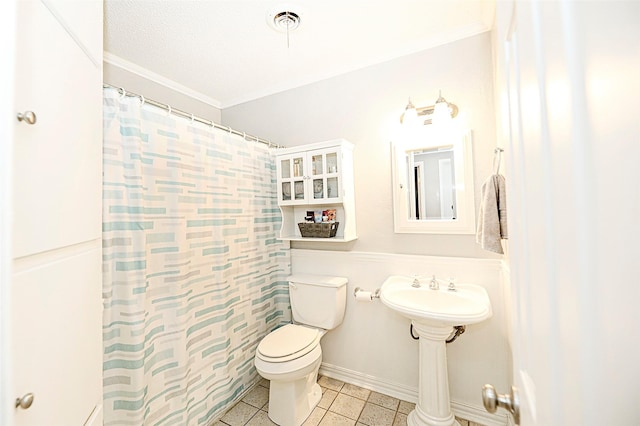 bathroom featuring crown molding, tile patterned flooring, a textured ceiling, a shower with curtain, and toilet