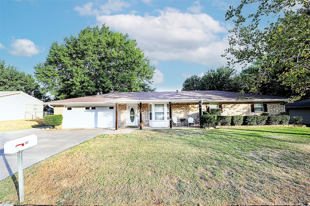 ranch-style home featuring a garage and a front lawn