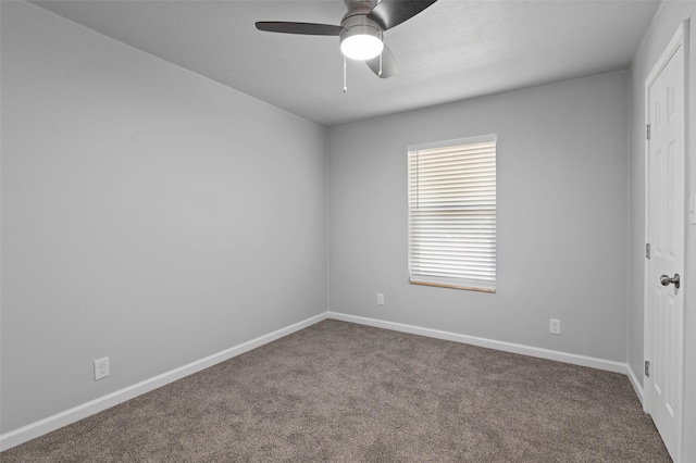 unfurnished bedroom with ceiling fan and carpet floors