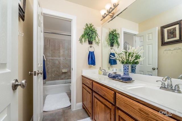 full bathroom featuring vanity, toilet, and combined bath / shower with glass door