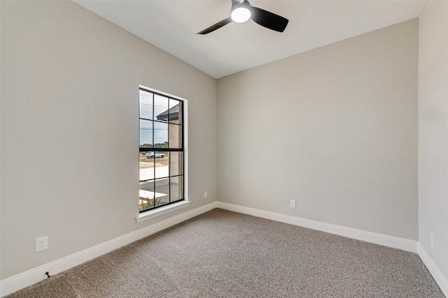 empty room with carpet floors and ceiling fan