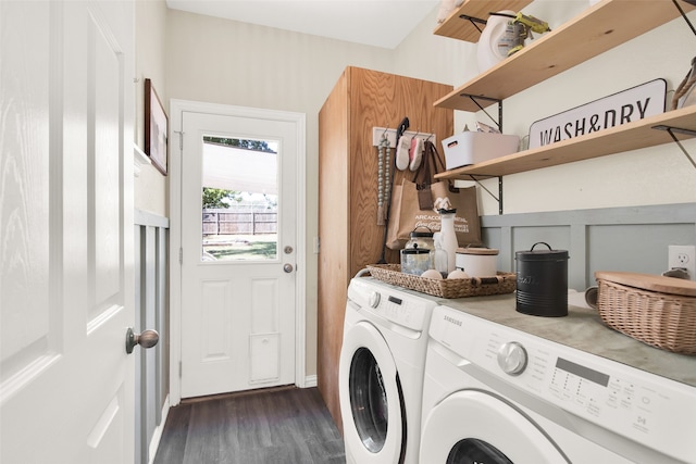 laundry room featuring washing machine and dryer and dark wood-type flooring