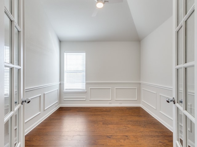 unfurnished room with ceiling fan, vaulted ceiling, french doors, and dark hardwood / wood-style floors