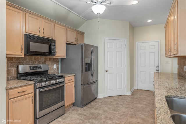 kitchen with tasteful backsplash, stainless steel appliances, light brown cabinetry, and light stone countertops