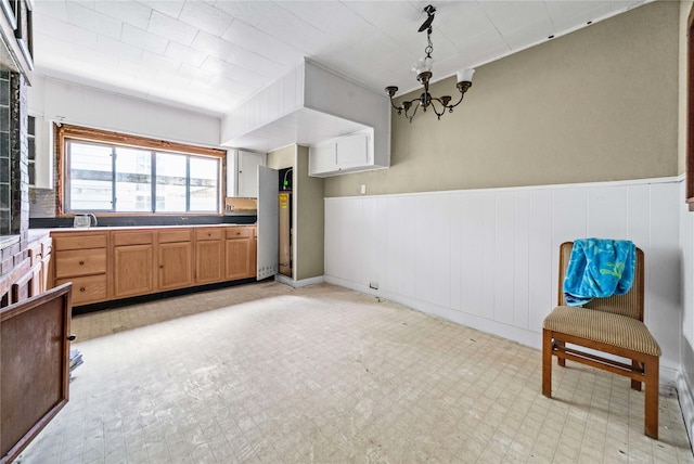 kitchen with a chandelier