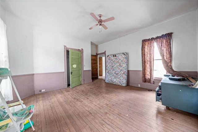 interior space featuring hardwood / wood-style flooring and ceiling fan