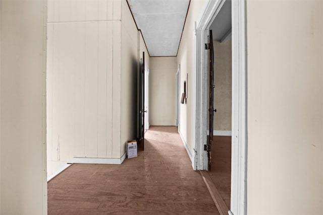 hallway with wood-type flooring