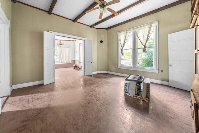 unfurnished room featuring hardwood / wood-style flooring, beamed ceiling, and ceiling fan