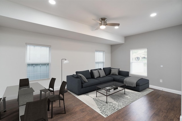 living room featuring hardwood / wood-style floors, ceiling fan, and a healthy amount of sunlight