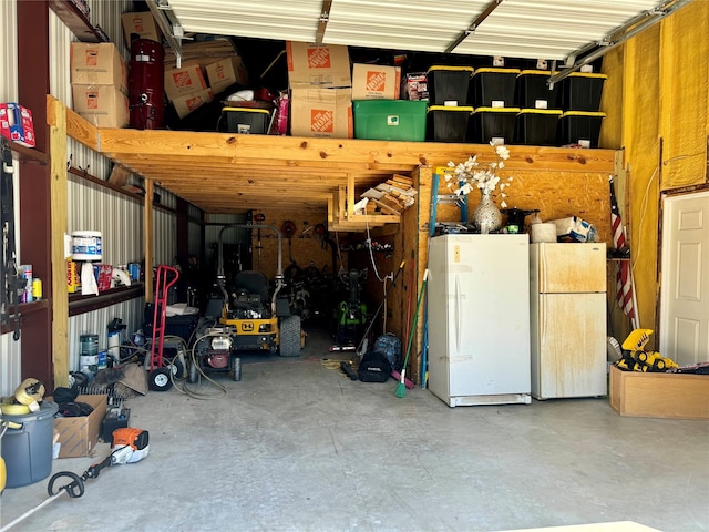 garage featuring white fridge