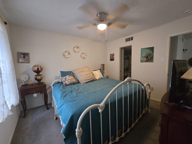 bedroom featuring ceiling fan, carpet floors, visible vents, and baseboards