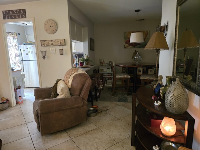 living area with light tile patterned floors