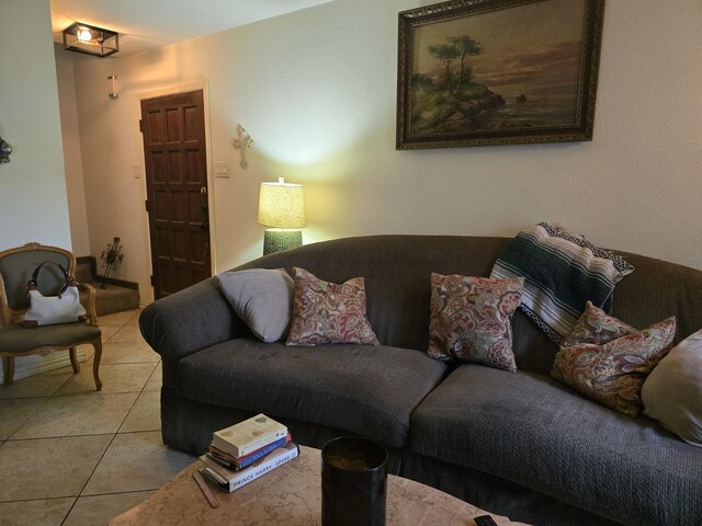 living room with light tile patterned floors