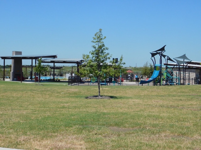 view of play area with a yard