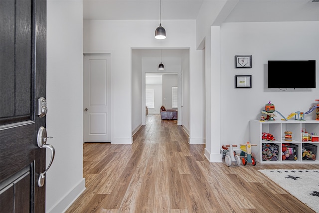 entrance foyer featuring light wood-type flooring