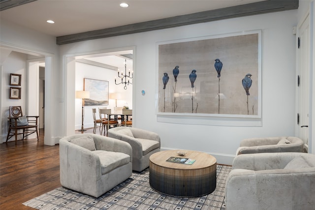 living room with hardwood / wood-style floors and a chandelier