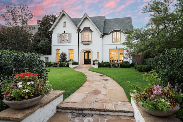 view of front of home featuring a yard