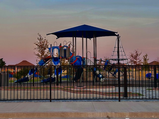 view of playground at dusk