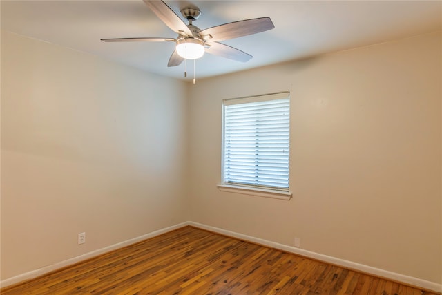 unfurnished room featuring ceiling fan and hardwood / wood-style floors