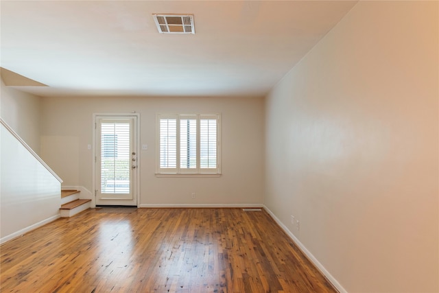 interior space with hardwood / wood-style flooring