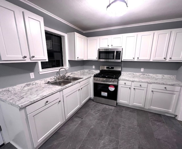 kitchen with sink, stainless steel appliances, and white cabinets