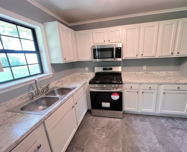 kitchen featuring tile patterned floors, white cabinetry, and appliances with stainless steel finishes