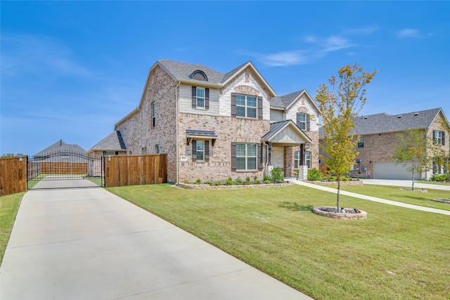 view of front of home featuring a garage and a front yard