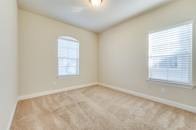 view of carpeted spare room