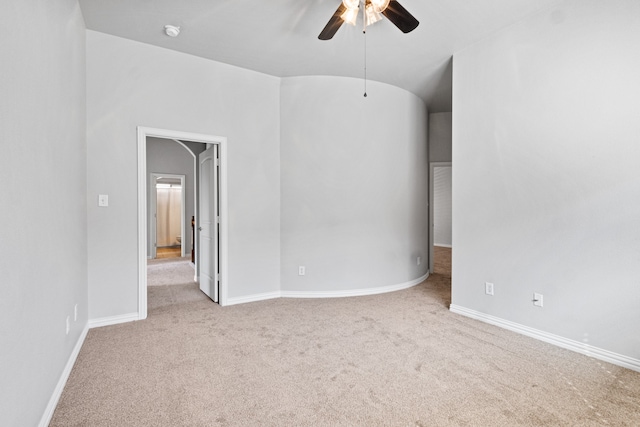 interior space with ceiling fan