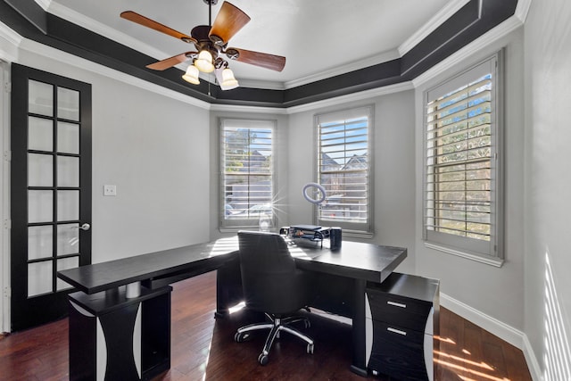 home office featuring ceiling fan, crown molding, and dark hardwood / wood-style floors