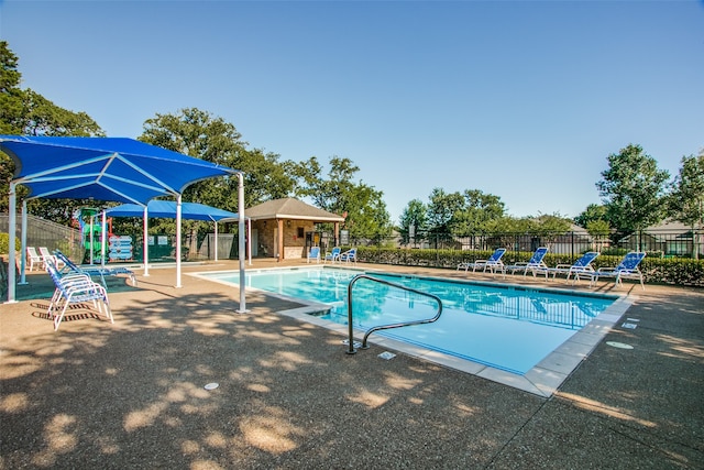 view of pool featuring a patio