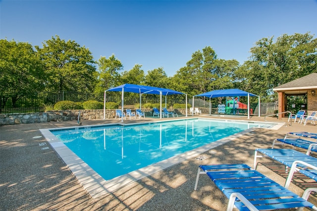 view of swimming pool with a gazebo and a patio area