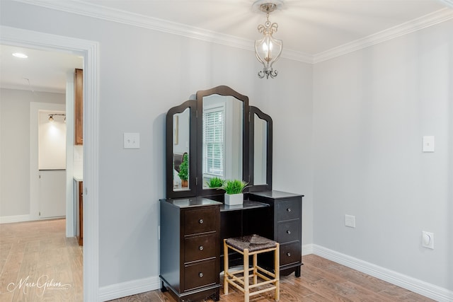 office featuring light wood-type flooring and crown molding