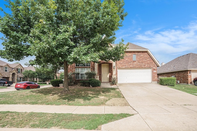 view of front of property featuring concrete driveway, brick siding, and an attached garage